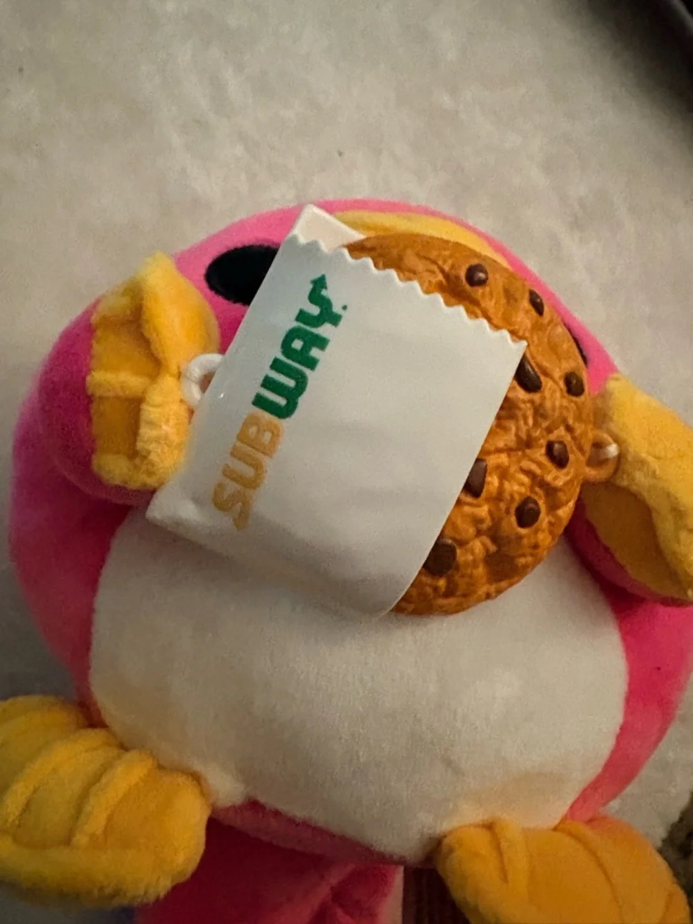 Plush Pink platypus Toy with Yellow Beak & Feet with subway cookie